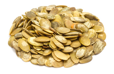 Handful of pumpkin seeds without shell, close up, isolated on white background
