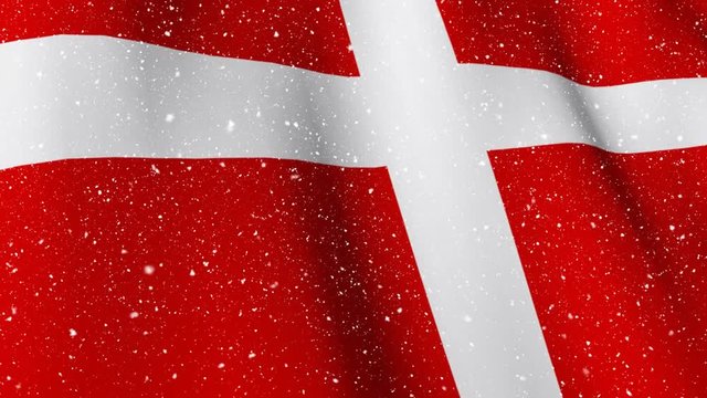 Danish flag waving during snowfall