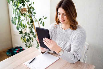 Fototapeta premium young woman with digital tablet