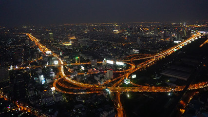 Panorama of the night of Bangkok from a height of a skyscraper. Thailand