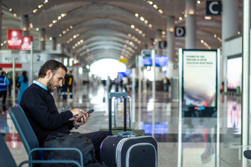 Passenger talking on the phone at the airport