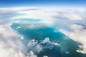 Aerial view of clouds and earth from above