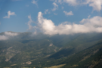 Mountains of Yanya Greece with a cloudy sky.