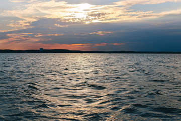 sea ​​waves texture at sunset