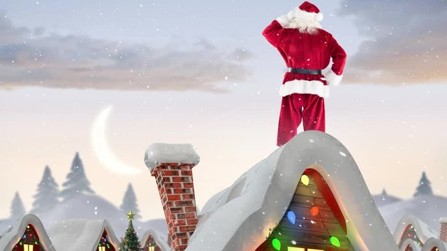 Santa clause on a roof of a decorated house in winter scenery combined with falling snow