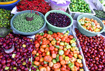 Red chili, Kabau, Jengkol, Tomato, Leunca, lemon on traditional market.