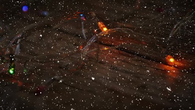 Video composition with snow over  lights on desk