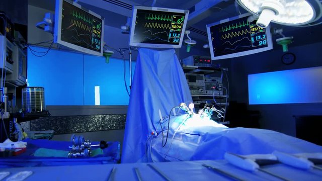 Hospital Laparoscopic medical training operation facility with modern digital monitors equipment and specialist sterile tools used by surgeons 