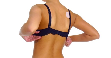 Taking off bra - sex and temptation concept