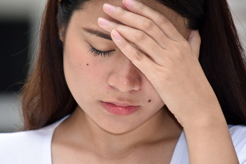 Obraz premium Young Filipina Female Under Stress