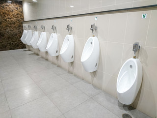 Empty public men toilet