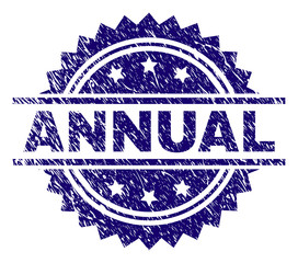 ANNUAL stamp seal watermark with distress style. Blue vector rubber print of ANNUAL label with dust texture.