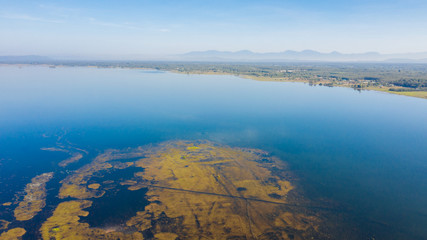 The art of water ecosystems is surrounded by mountains.
