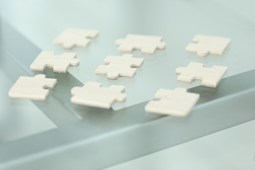 closeup.the pieces of the puzzle on the desktop