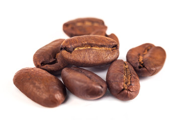 roasted coffee beans isolated on white background
