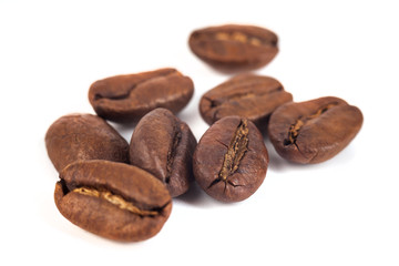 roasted coffee beans isolated on white background