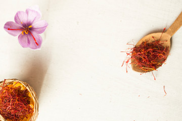 saffron flower and types in a spoon