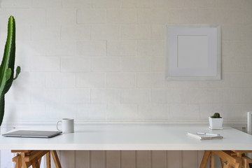 Fototapeta na wymiar Scandinavian workspace white table and copy space.
