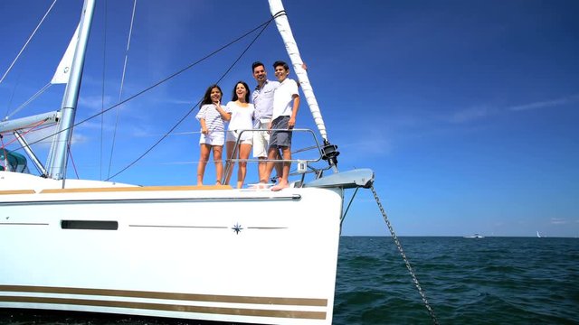 Florida May 2017 Freedom of the ocean for healthy Hispanic family on outdoor activity vacation on luxury yacht making memories 