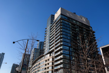 Obraz premium Toronto, Canada – December 4th 2018 tall apartment skyscrapers above Toronto under the blue skies