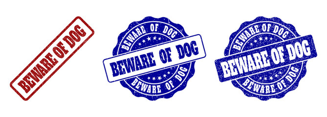 BEWARE OF DOG grunge stamp seals in red and blue colors. Vector BEWARE OF DOG labels with grunge surface. Graphic elements are rounded rectangles, rosettes, circles and text titles.