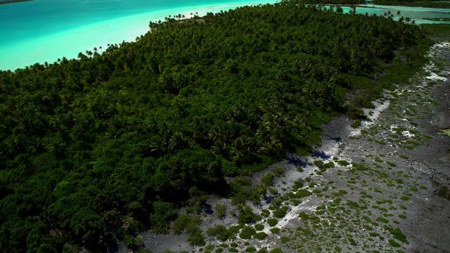 Aerial view of Tupai Heart Island coral reef atoll in French Polynesia