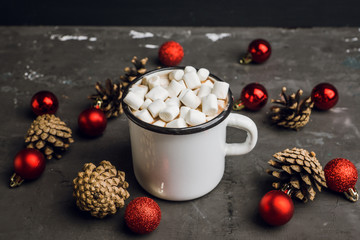 Sweet hot chocolate in mug. Christmas drink with marshmallow. Selective focus. Shallow depth of field. 