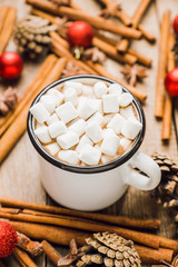 Sweet hot chocolate in mug. Christmas drink with marshmallow. Selective focus. Shallow depth of field. 