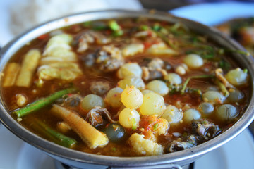 Giant sea catfish eggs with spicy  sour soup and vegetable