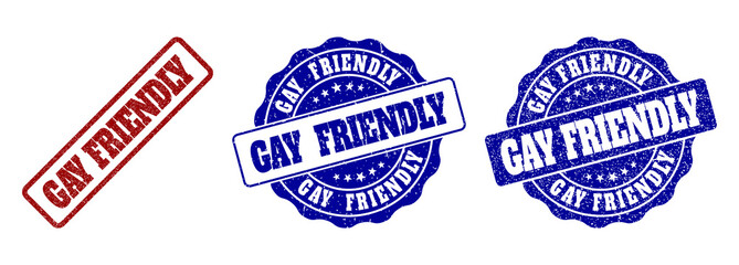 GAY FRIENDLY grunge stamp seals in red and blue colors. Vector GAY FRIENDLY labels with grunge style. Graphic elements are rounded rectangles, rosettes, circles and text captions.