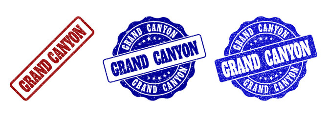 Obraz premium GRAND CANYON grunge stamp seals in red and blue colors. Vector GRAND CANYON overlays with grunge style. Graphic elements are rounded rectangles, rosettes, circles and text labels.