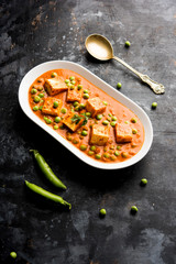 Green peas or matar paneer curry recipe, served in a bowl. selective focus