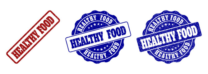 HEALTHY FOOD grunge stamp seals in red and blue colors. Vector HEALTHY FOOD imprints with grunge surface. Graphic elements are rounded rectangles, rosettes, circles and text captions.