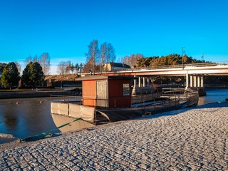 Boat parked on the river Bank in Finland