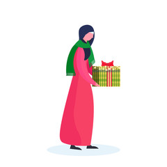 Arab woman traditional clothes holding gift box