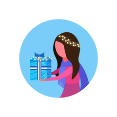 Girl holding gift box happy new year