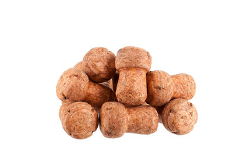 Fototapeta na wymiar Pile of corks from champagne or sparkling wine on a white background isolated close up
