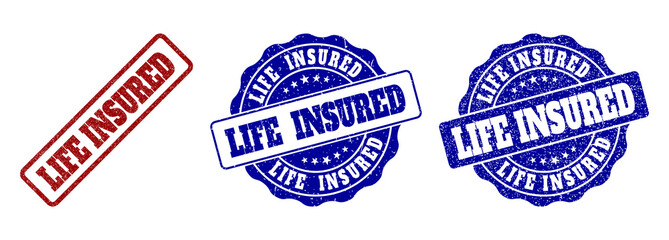 Obraz premium LIFE INSURED scratched stamp seals in red and blue colors. Vector LIFE INSURED watermarks with grainy style. Graphic elements are rounded rectangles, rosettes, circles and text captions.