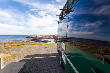 Camper car on norwegian sea coast