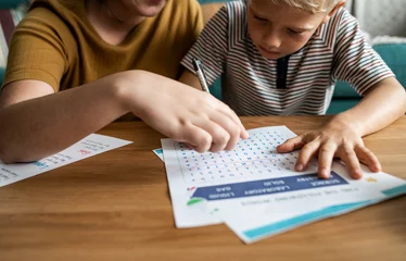Foto op Plexiglas Sister playing word search with her little brother © Rawpixel.com