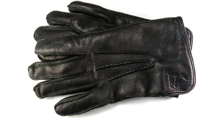 Pair of men's black leather gloves isolated on white background