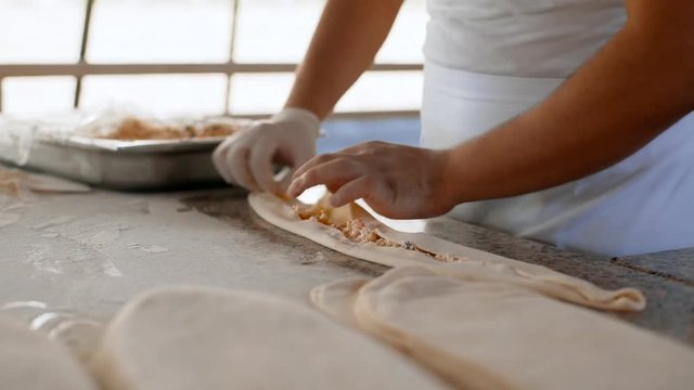 A man prepares delicious traditional Turkish cakes Pida. 4k