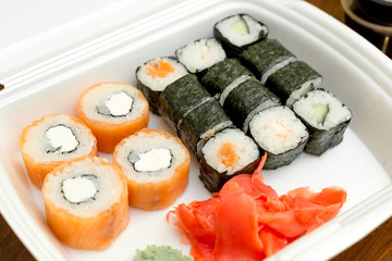 rolls and sushi, Japanese fast food, boxed food, lunch