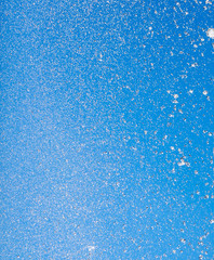 Splashes of water against the blue sky