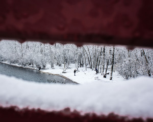 View through bridge while snowing