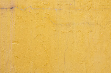 Yellow concrete wall texture and background