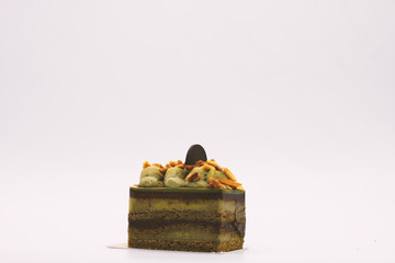 Green tea cake on white background