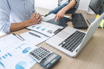 Business team meeting working with new startup project, discussion and analysis data the charts and graphs, laptop computer using, Business finances and accounting concept