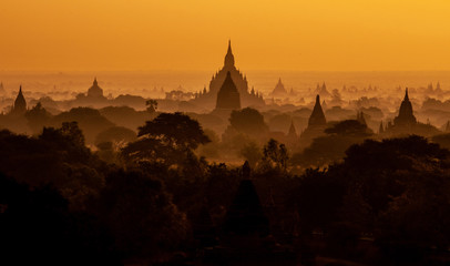 Amazing sunrise with the ancient architecture of a thousand Pagodas in Bagan Kingdom, Myanmar