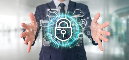 Businessman holding a Security padlock wheel icon with multimedia and social media icon 3d rendering